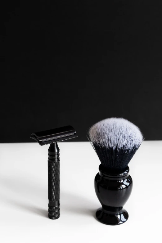 the shaving brush is positioned next to the shaver