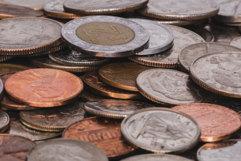 an assortment of coins and coins from the united kingdom