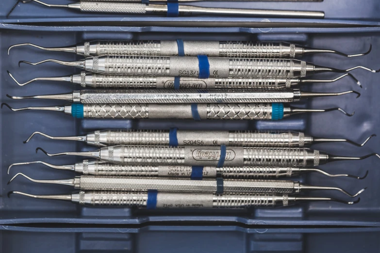 five sys in a blue compartment with three tubes