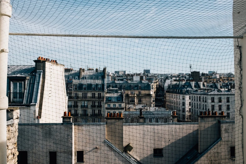 a view from the windows of an old building in a city