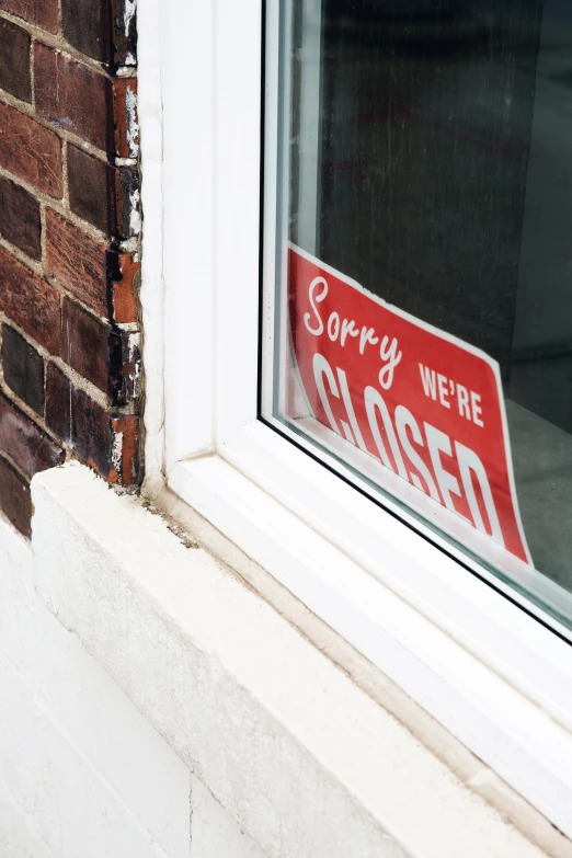 a sign that is taped into a window