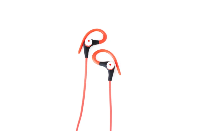 a pair of red headphones standing next to each other