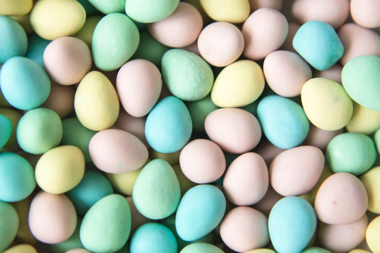 a close up view of pastel colored candies