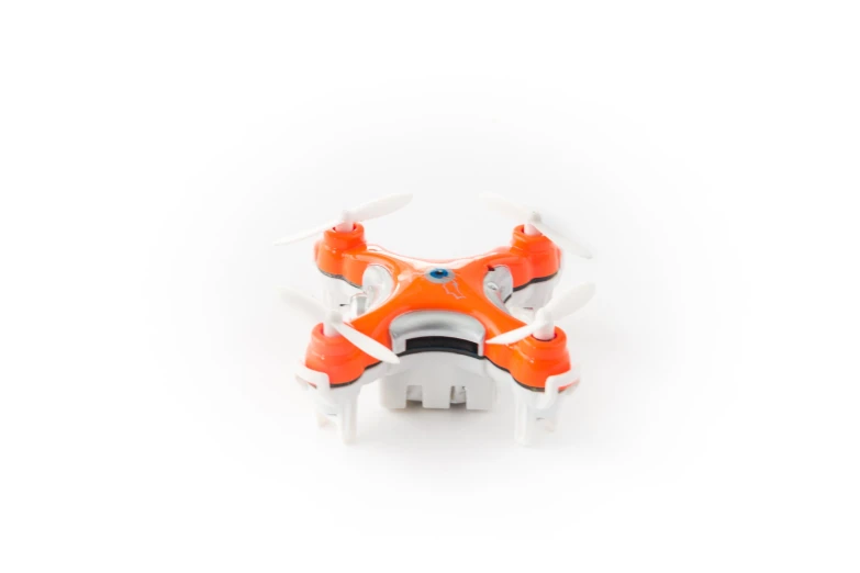 an orange and white plastic toy that has propellers