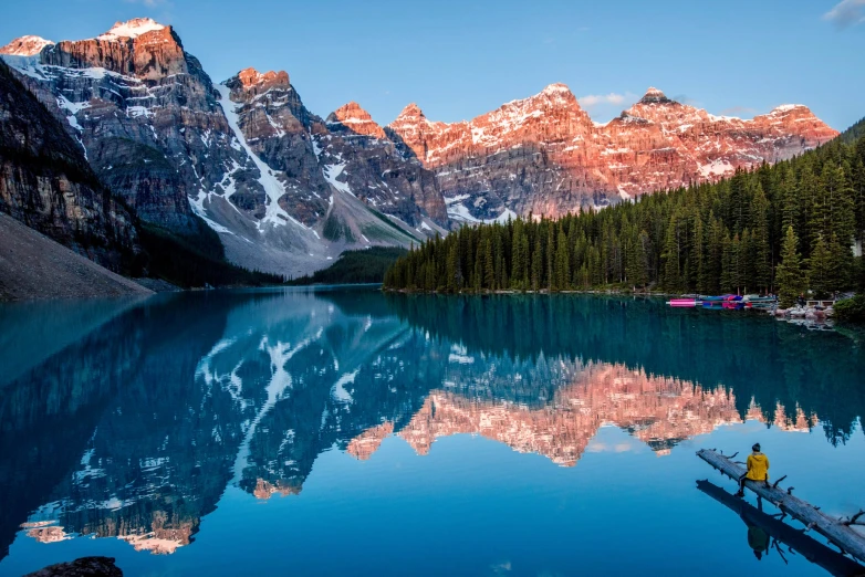 there is a person on a boat at the bottom of a lake