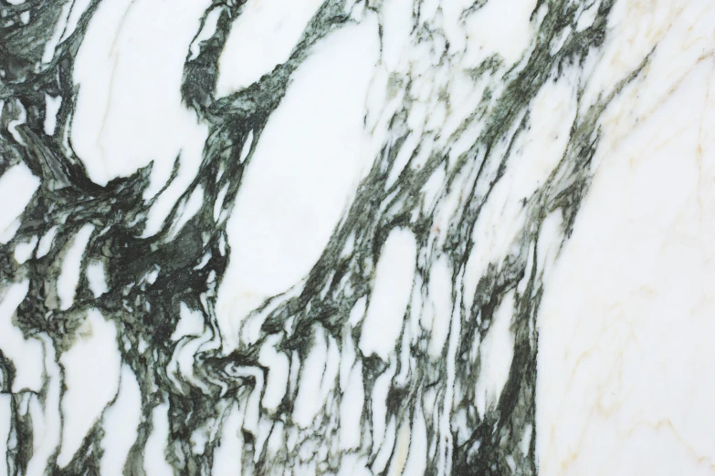 an image of marble counter top textured with paint