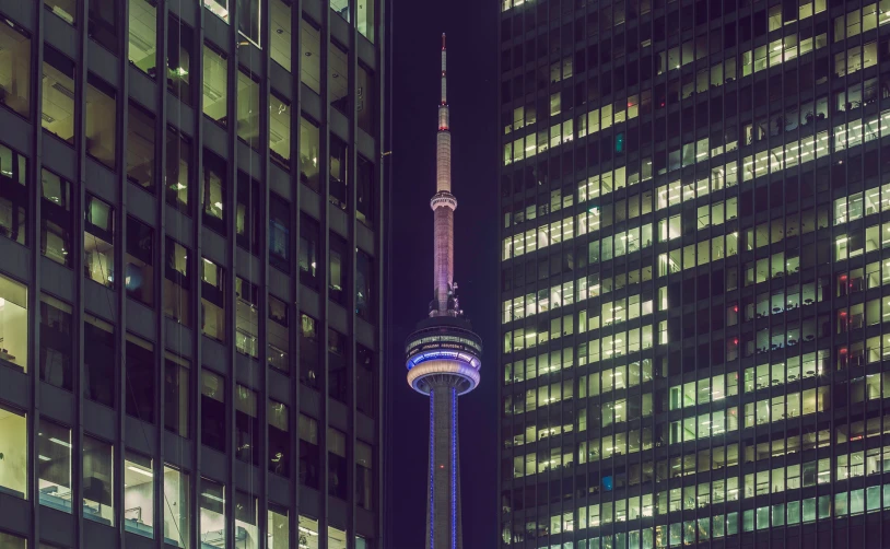 the light and building in the city are lit up