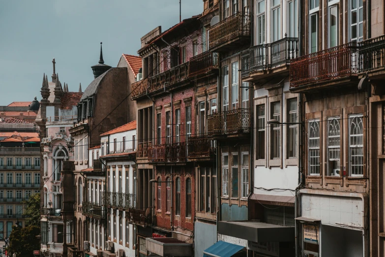 a street with multiple old building next to each other