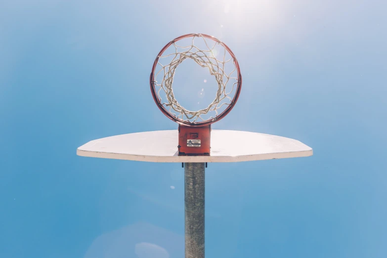 a basketball goal with some chains inside