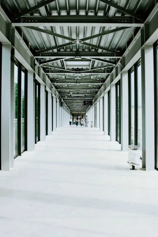 the walkway is empty of people and many windows