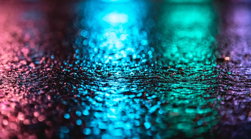 a closeup of a shiny, colorful surface