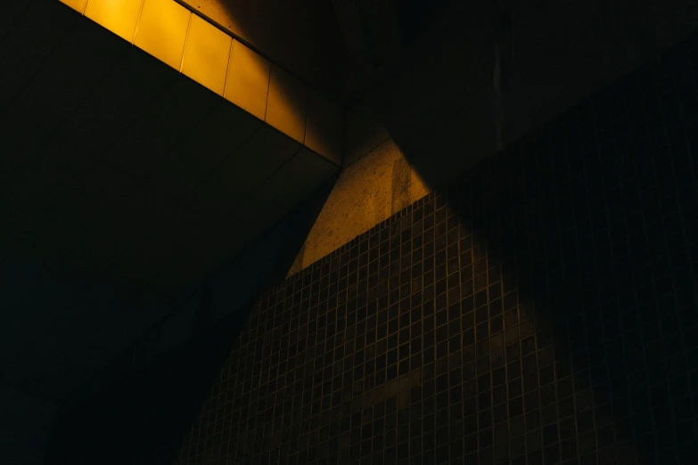 a dark night time scene of a subway station