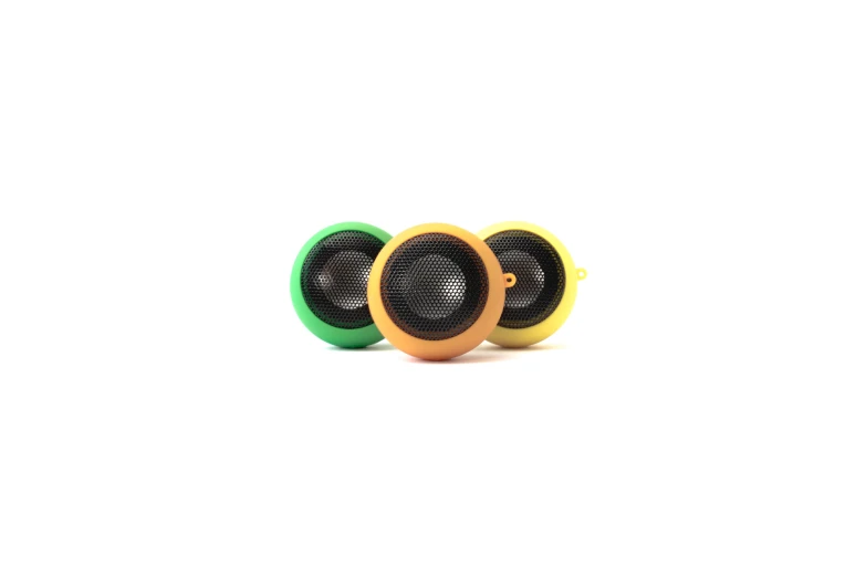 an image of three yellow and green speakers