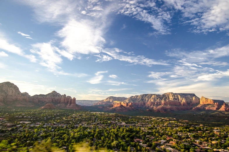 mountains rise high in the sky in a scenic landscape