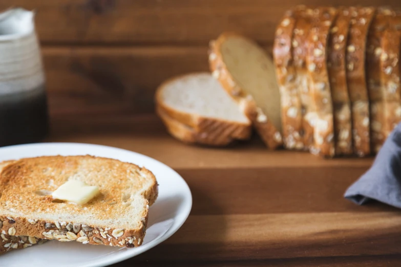 two slices of bread are cut in half on a white plate