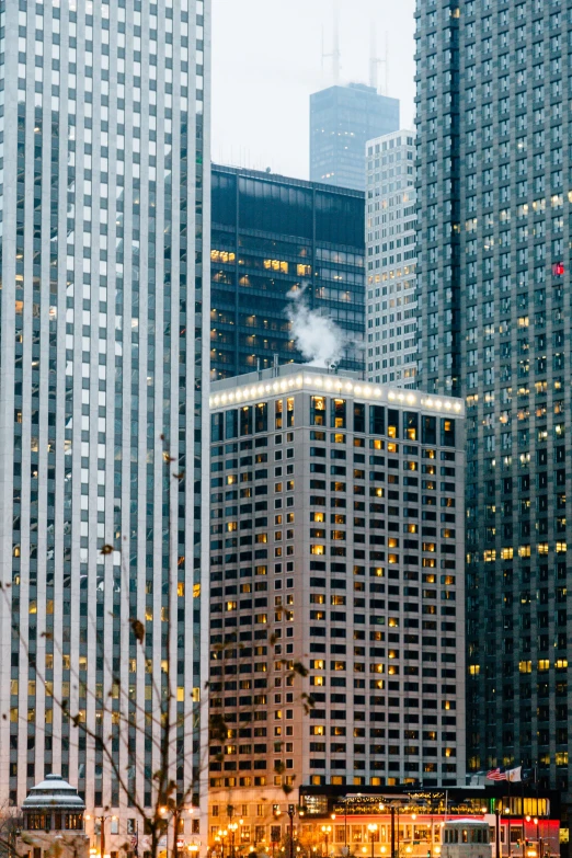 some buildings that are lit up and next to each other