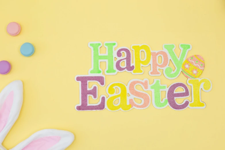 happy easter lettering with decorated eggs and decorations
