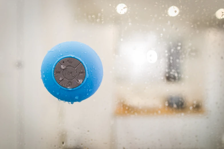 there is an image of a shower head with rain on it