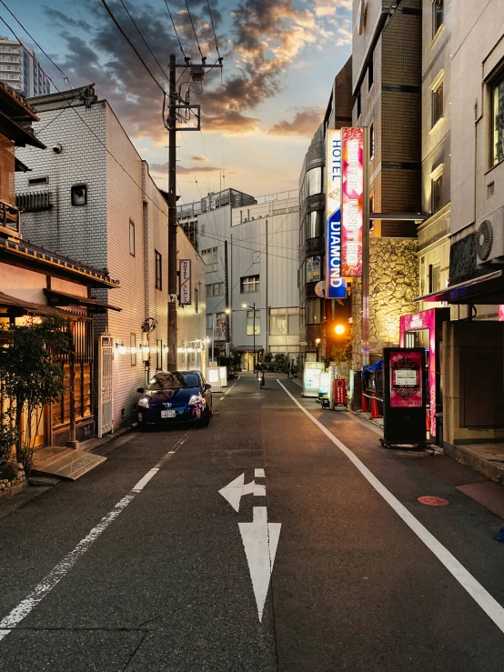 an empty street with a road marking two lanes