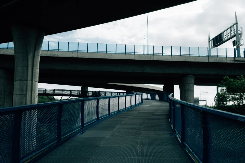 there is a very large bridge with lots of support for boats to sail on