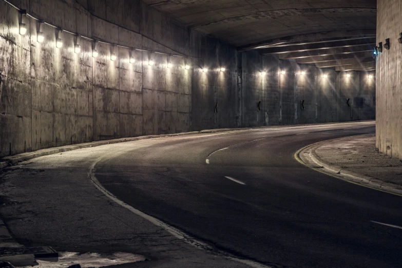 the lights are on at an empty tunnel