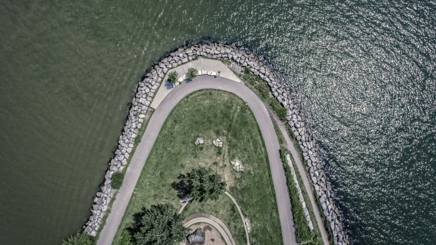 an aerial view of an island by the water