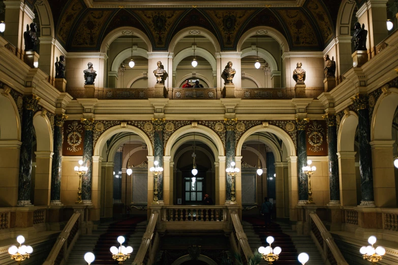 a couple of buildings with lots of stairs inside of them