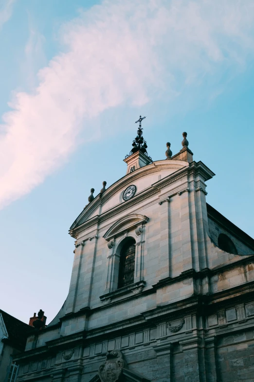 a church tower with clocks on it and no people