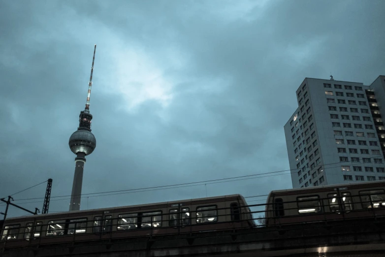 a train is on the tracks near buildings