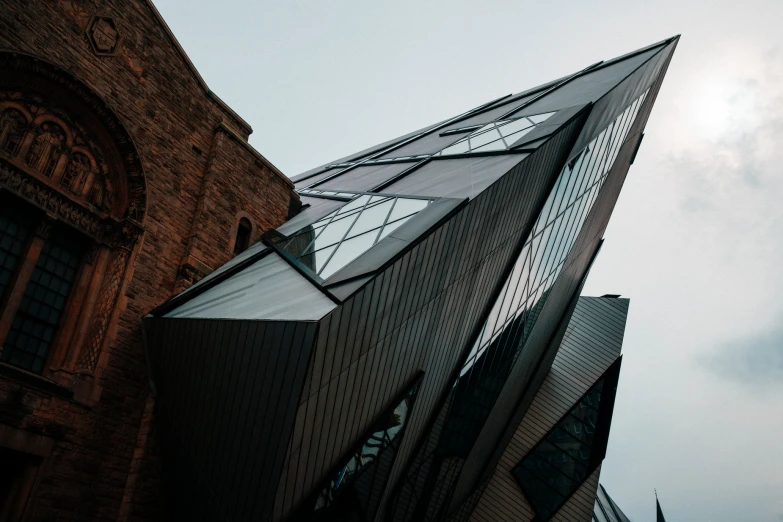 a large brick building with a triangular design