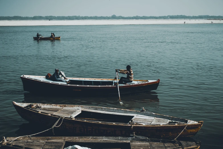 some little boats that are in the water