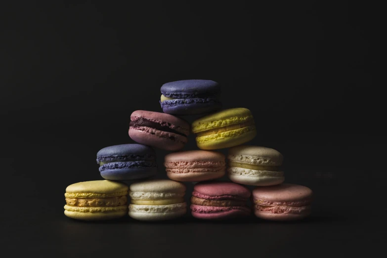 the macarons are lined up and ready to be eaten
