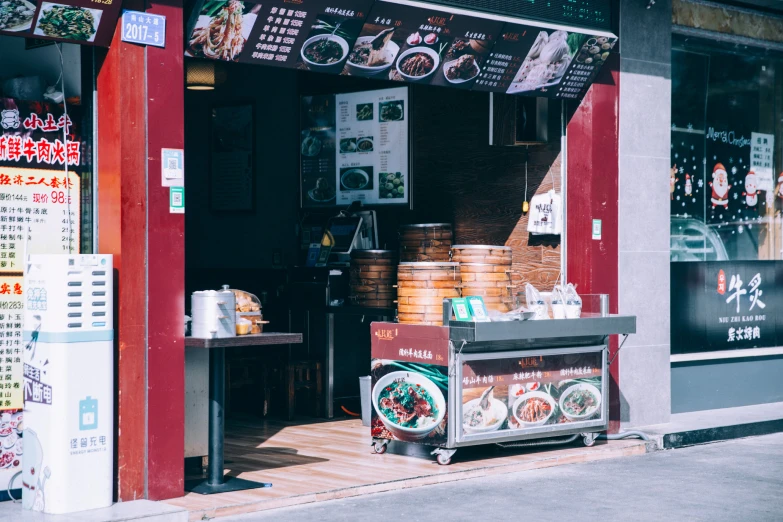 an asian street food stand in a small town