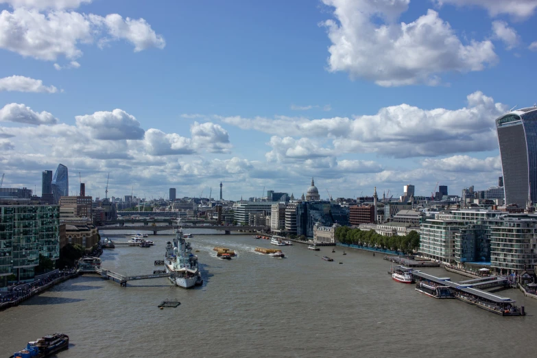 a cityscape with many boats and buildings in it