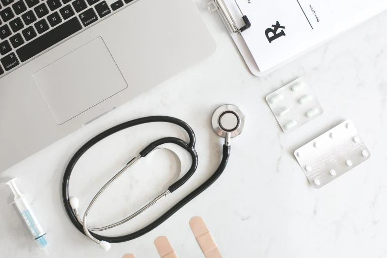 a desk with some medical supplies sitting next to it