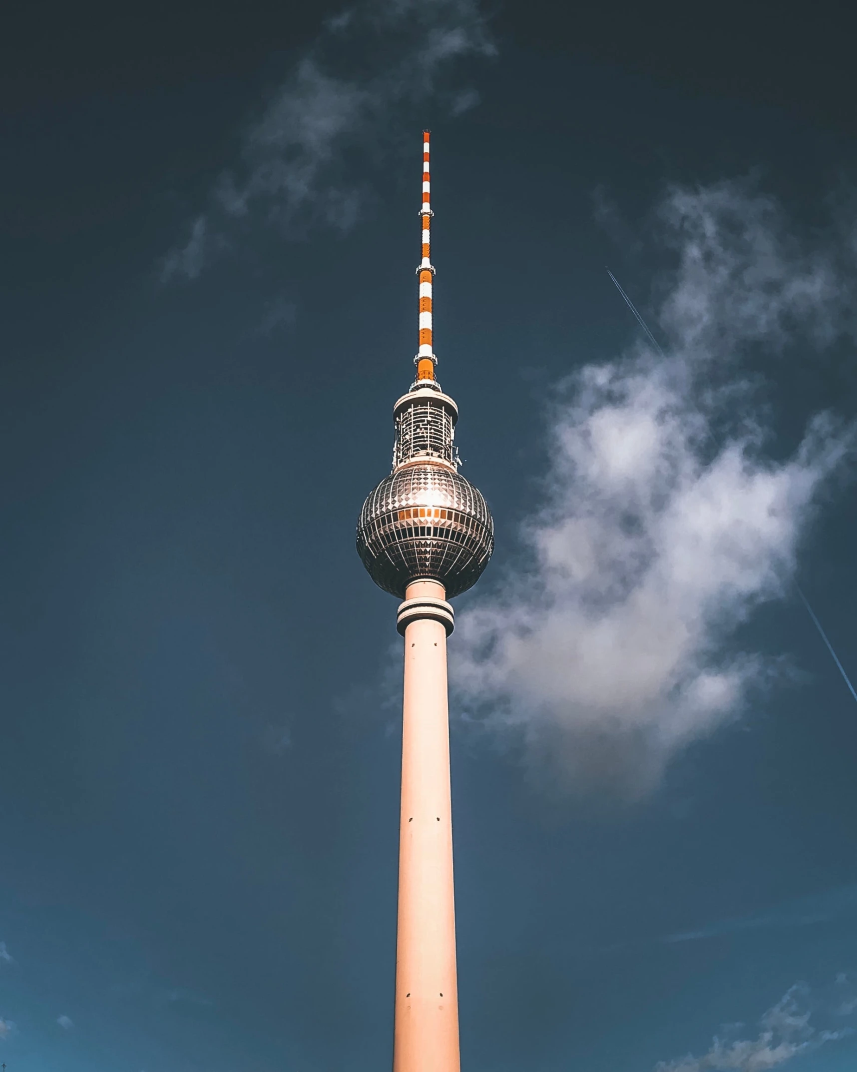 the television tower looks majestic against the clear sky