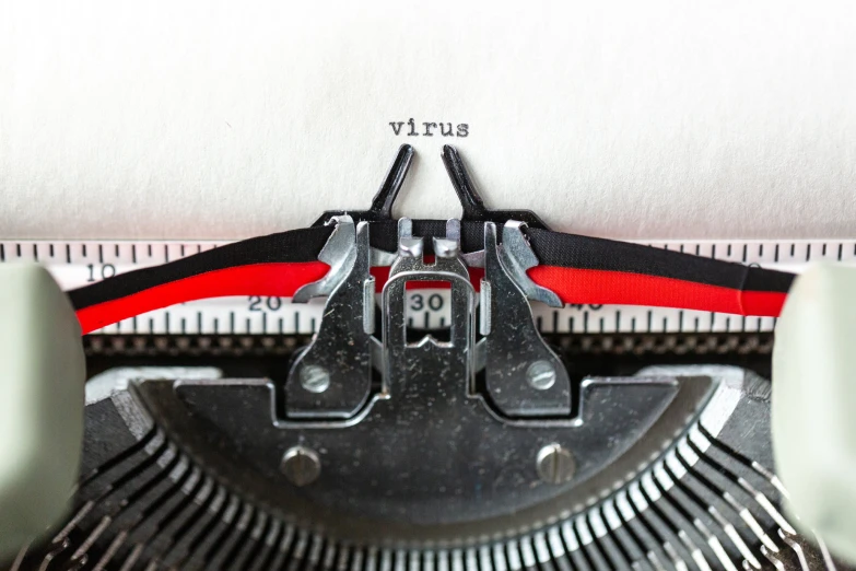 an old fashioned typewriter with focus on the paper