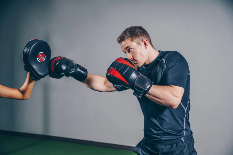 an athletic man is attempting to take his opponent out