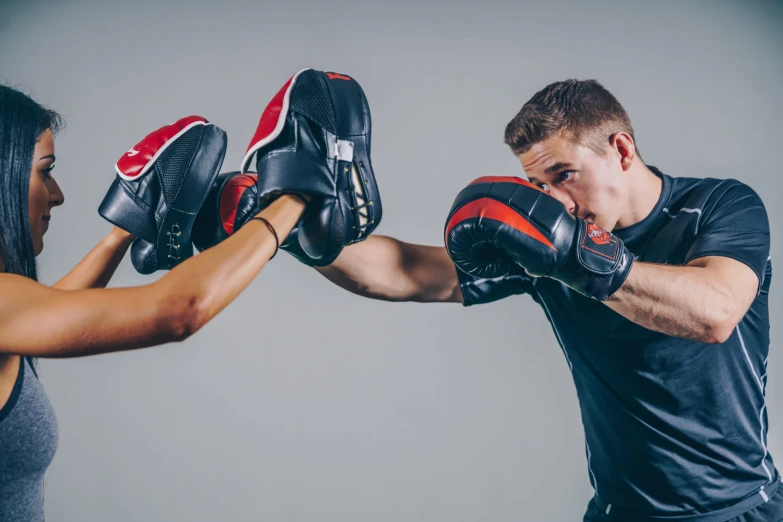 a man and a woman fight each other