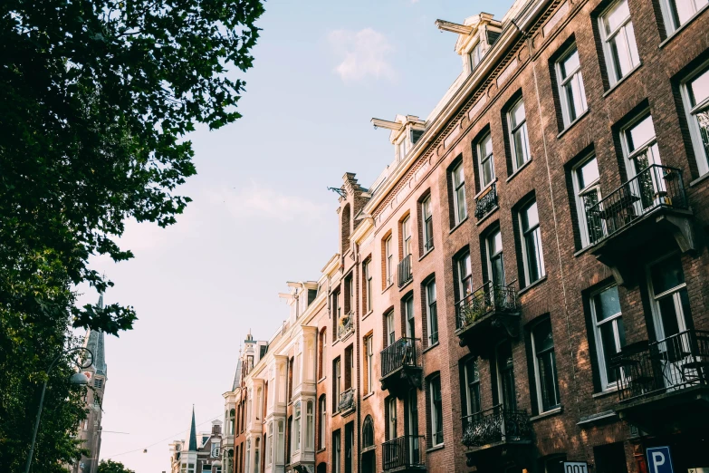 several buildings with balconies line the side of this street