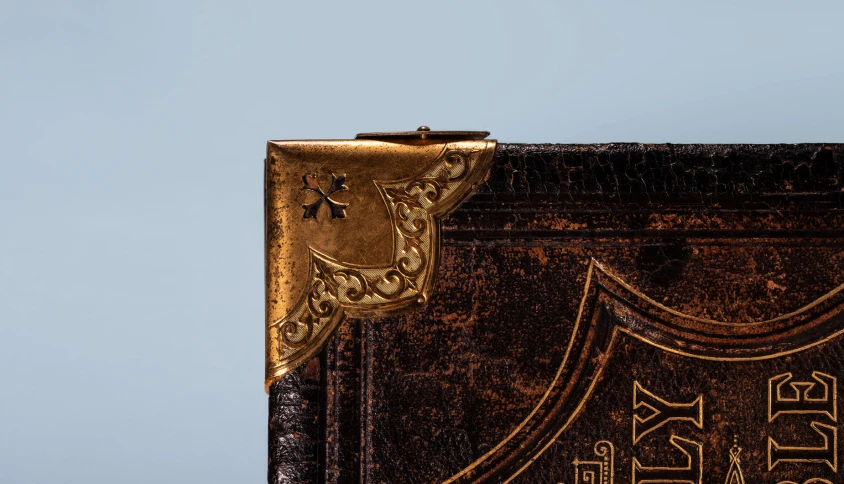 a book cover showing writing with an ornate design