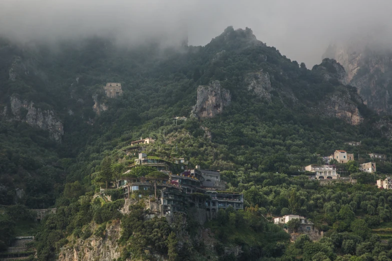 a mountain covered with lots of green vegetation