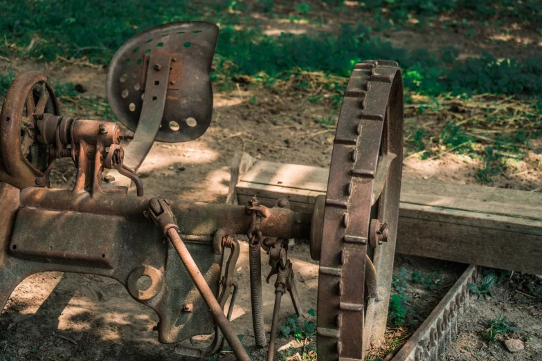 a couple of machinery that is sitting in the dirt