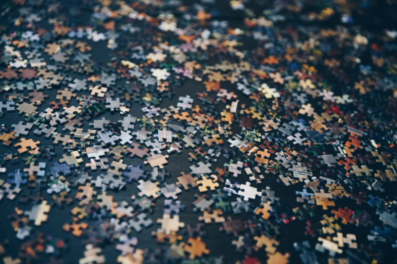 a large complex puzzle with multiple pieces missing