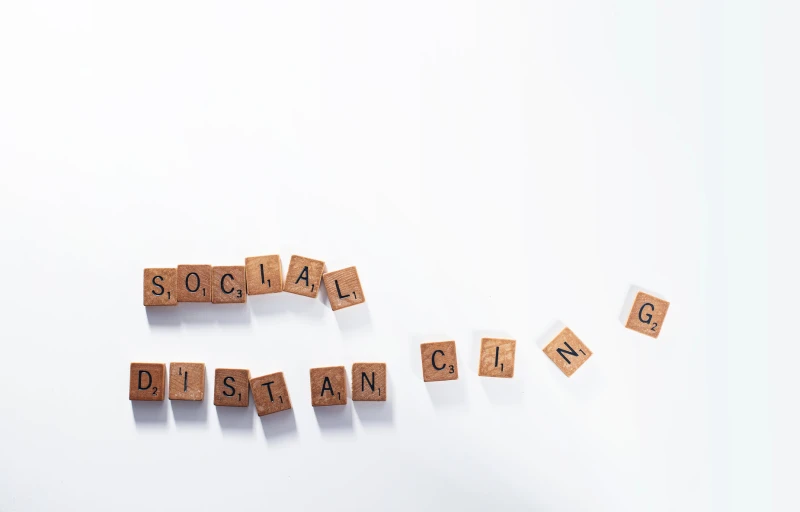 the word social disnaps made from brown wood blocks