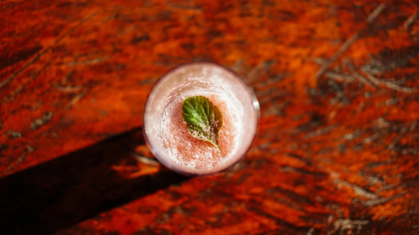 a view of a drink on top of a wooden table