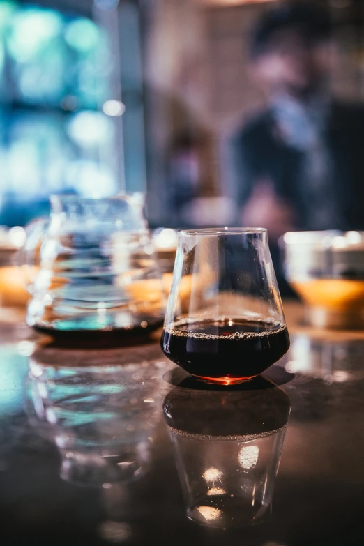 a table with different kinds of glasses on it