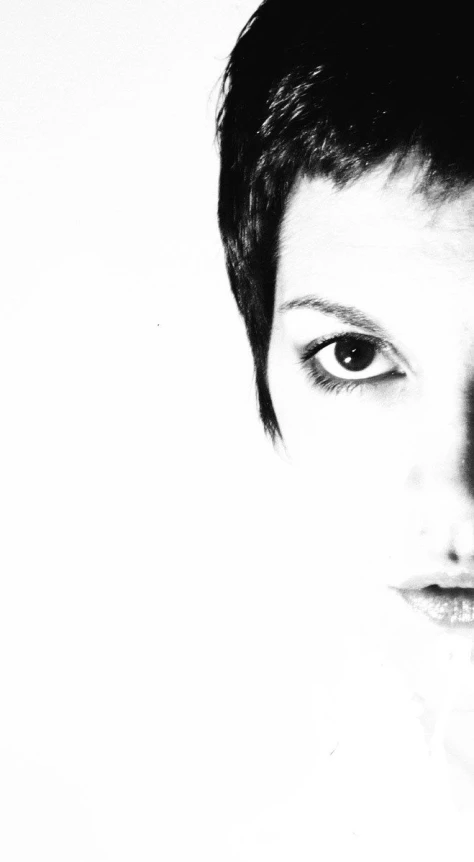 a black and white po of a woman's face