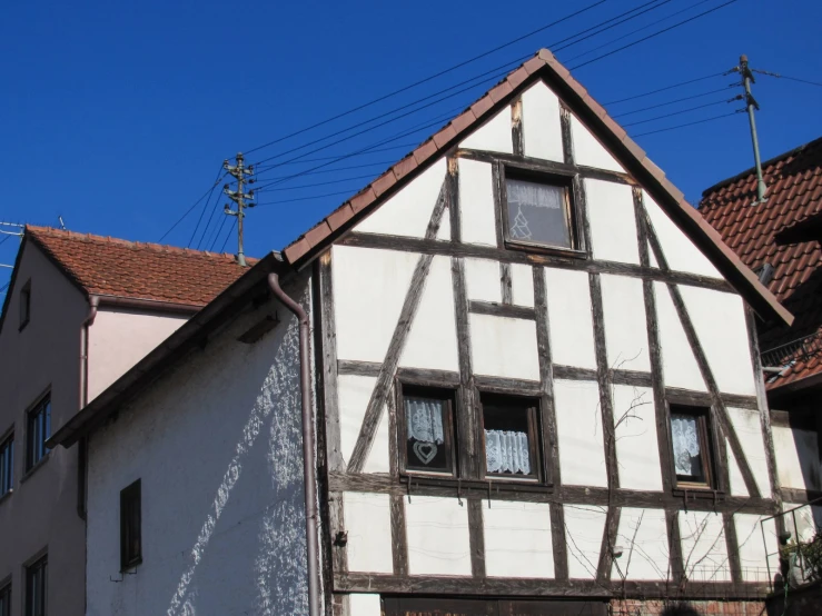 a row of buildings with windows next to each other