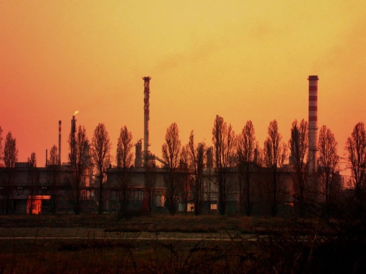 factory building with sky in the background